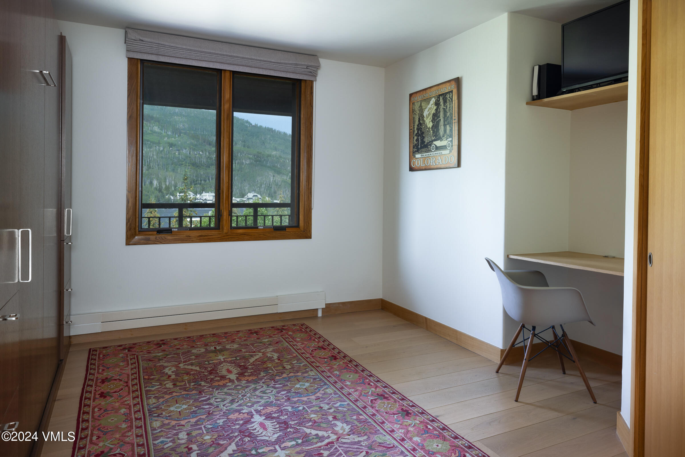 15 Highlands Lane, Unit R407 Beaver Creek, CO 81620 - Photo 9 of 18 a view of room with window and furniture