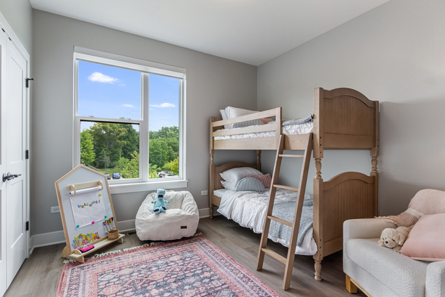 5424 Old Orchard Road Skokie, IL 60077 - Photo 26 of 56 a bedroom with furniture and a window