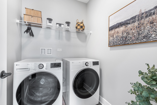 5424 Old Orchard Road Skokie, IL 60077 - Photo 28 of 56 a utility room with dryer and washer