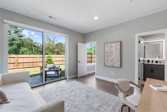 5424 Old Orchard Road Skokie, IL 60077 - Photo 30 of 56 a living room with furniture and large windows