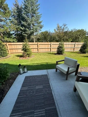 a black and white photo of a living room