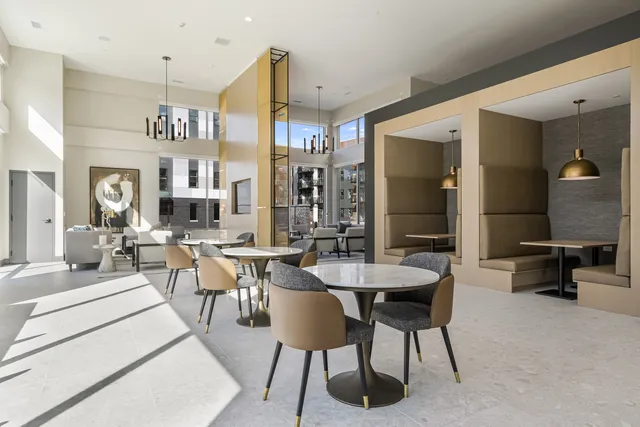 a view of a dinning table and chairs in the patio