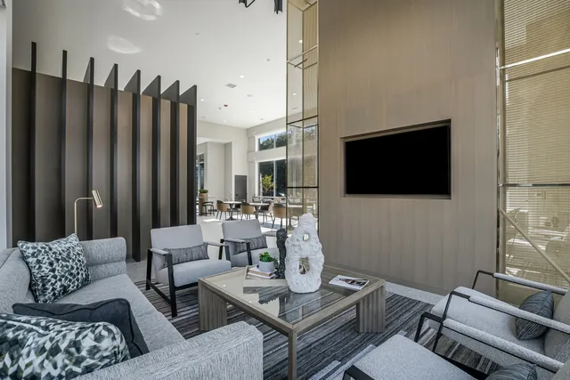 a large kitchen with stainless steel appliances granite countertop a sink and dishwasher