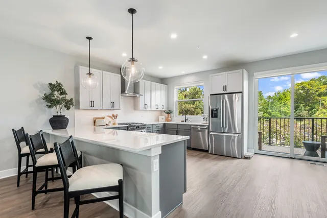a large kitchen with cabinets