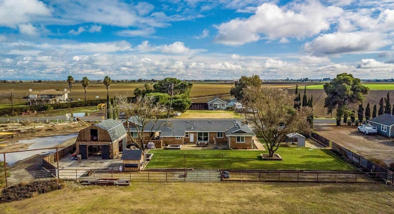 18393 Paradise Road Tracy, CA 95304 - Photo 15 of 36 a view of a town with large trees