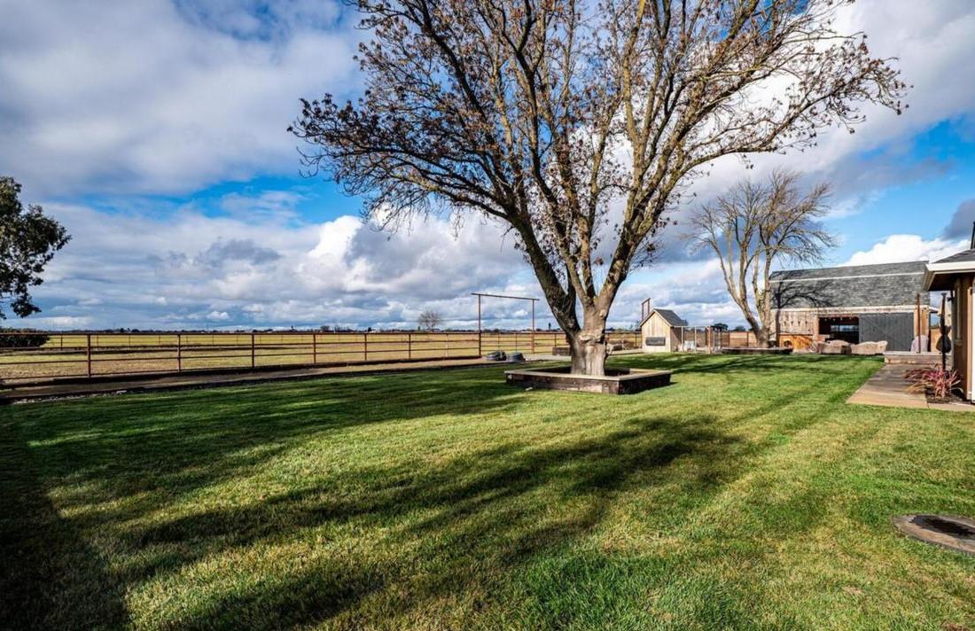 18393 Paradise Road Tracy, CA 95304 - Photo 20 of 36 a view of a park with large trees