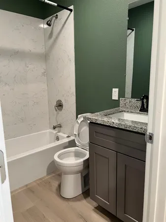 a view of a room that has a window