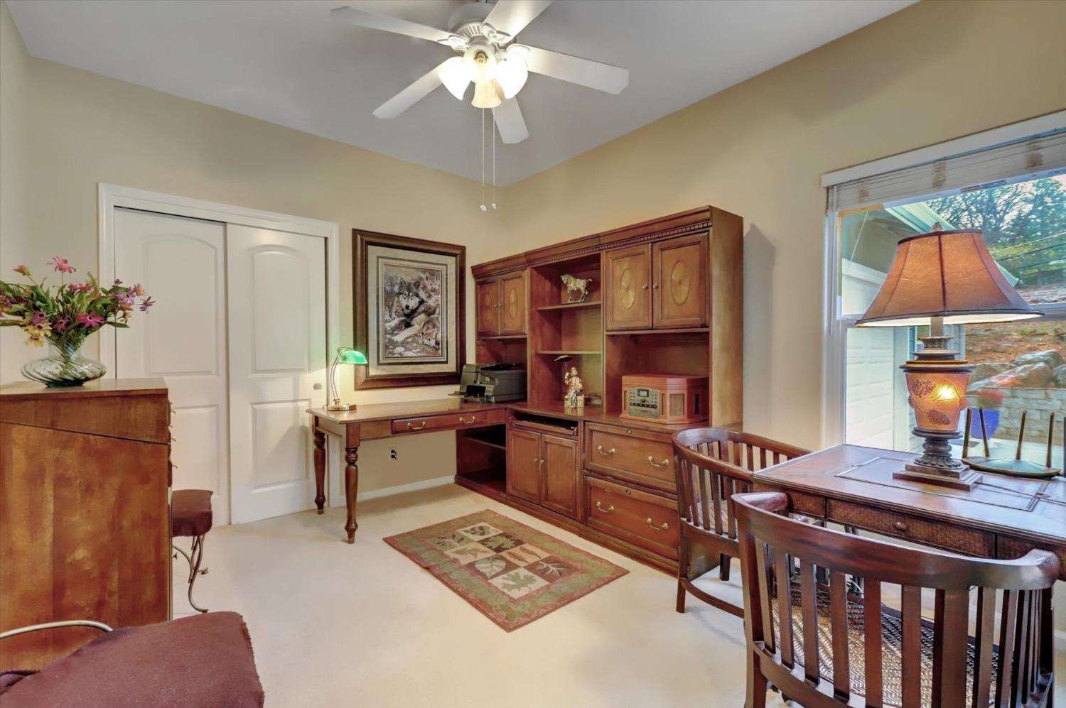 17036 Alice Way Grass Valley, CA 95949 - Photo 23 of 58 a very nice looking living room with a couch and a chandelier