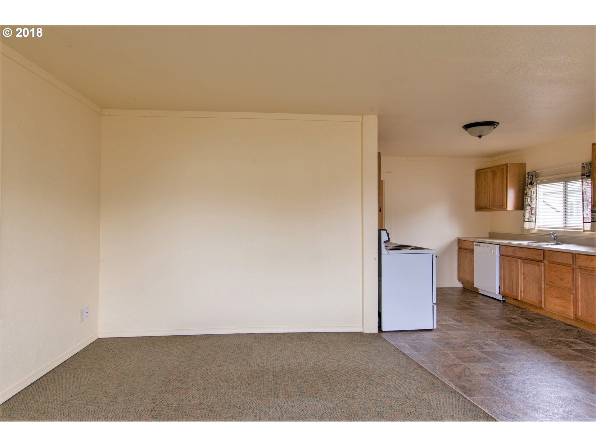 381 North 10th Street Reedsport, OR 97467 - Photo 9 of 27 Kitchen/Living Room