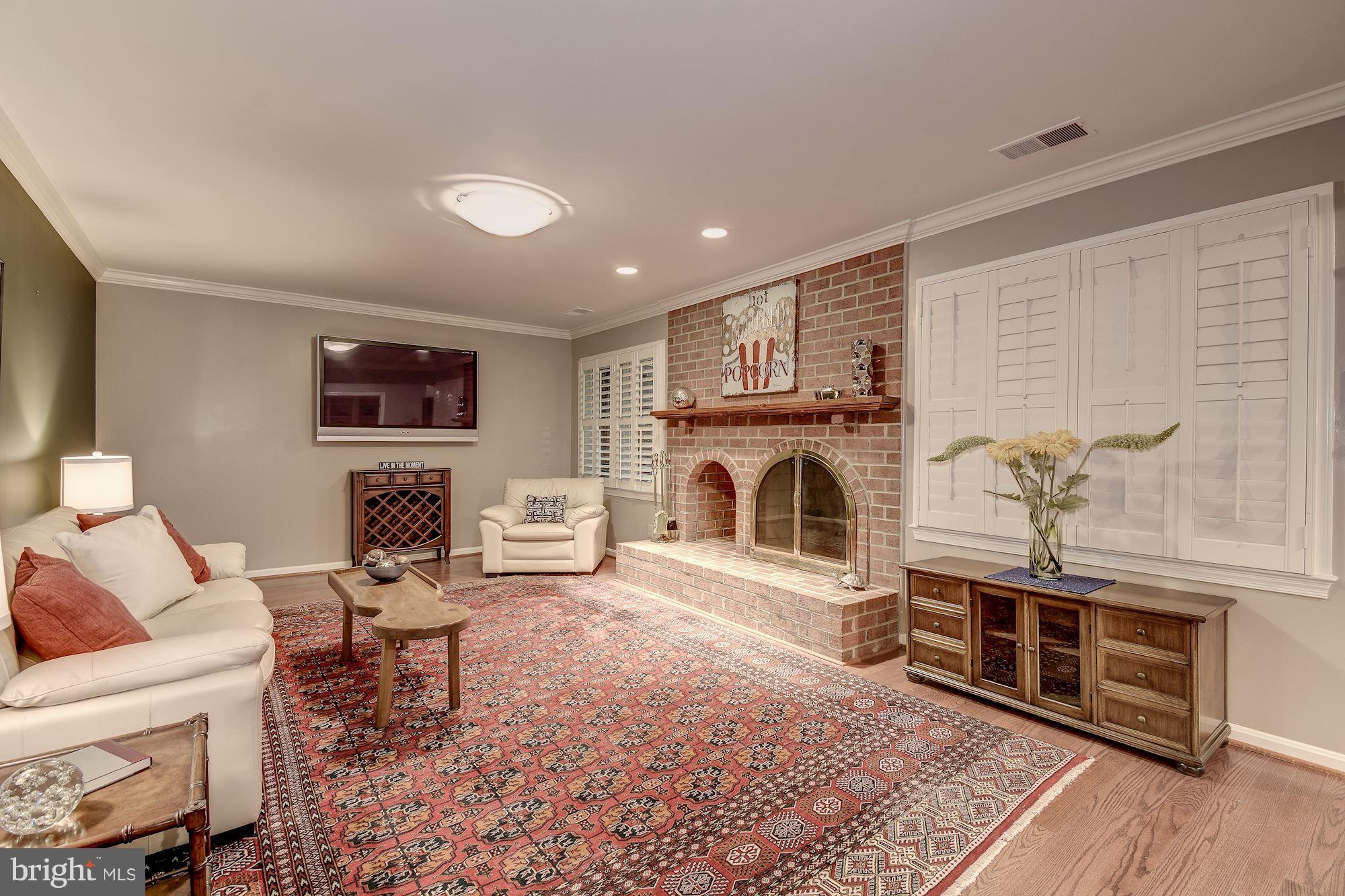 3900 North Glebe Road Arlington, VA 22207 - Photo 23 of 30 Recreation Room w/Fireplace