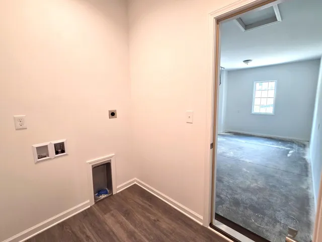 a view of a room with large windows