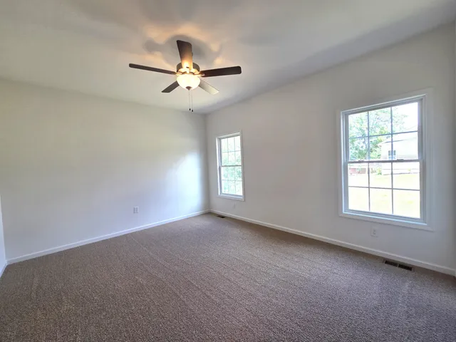 a view of hallway with stairs