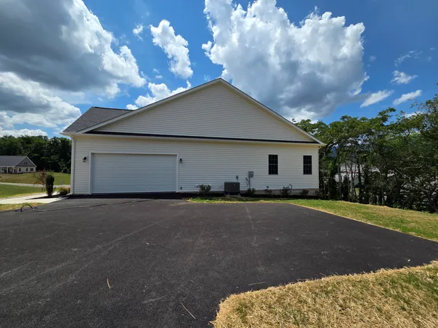 a view of a backyard with garden