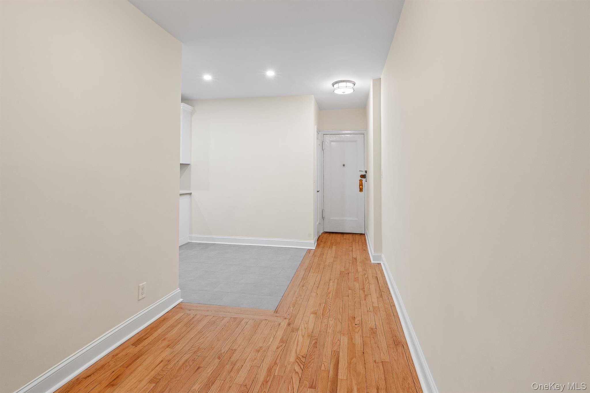 110-07 73rd Road, Unit 2K Queens, NY 11375 - Photo 12 of 17 a view of hallway with wooden floor