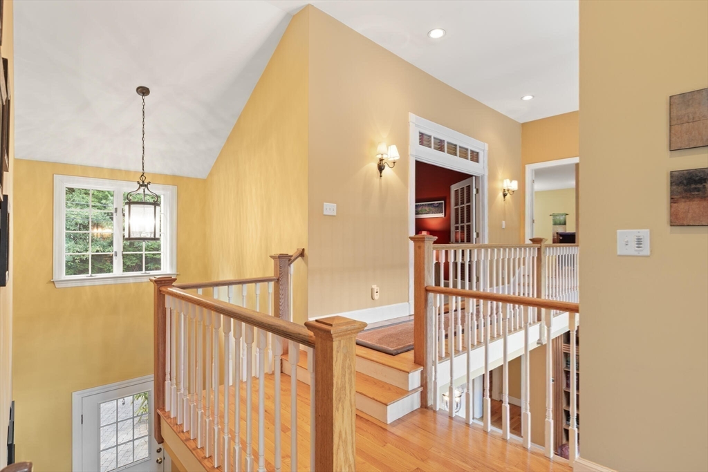 26 Cross Road Boxford, MA 01921 - Photo 17 of 41 a view of a hallway with a window