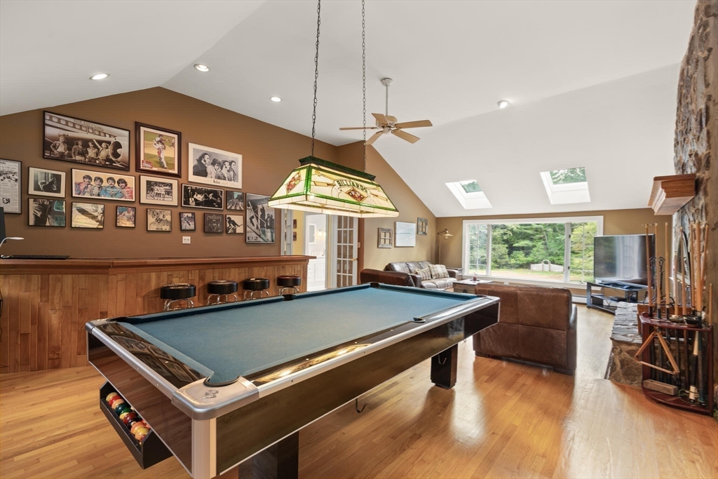 26 Cross Road Boxford, MA 01921 - Photo 20 of 41 a living room with furniture pool table and a large window
