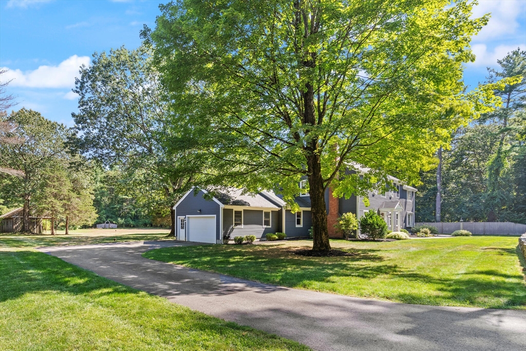 26 Cross Road Boxford, MA 01921 - Photo 2 of 41 a front view of a house with yard and green space