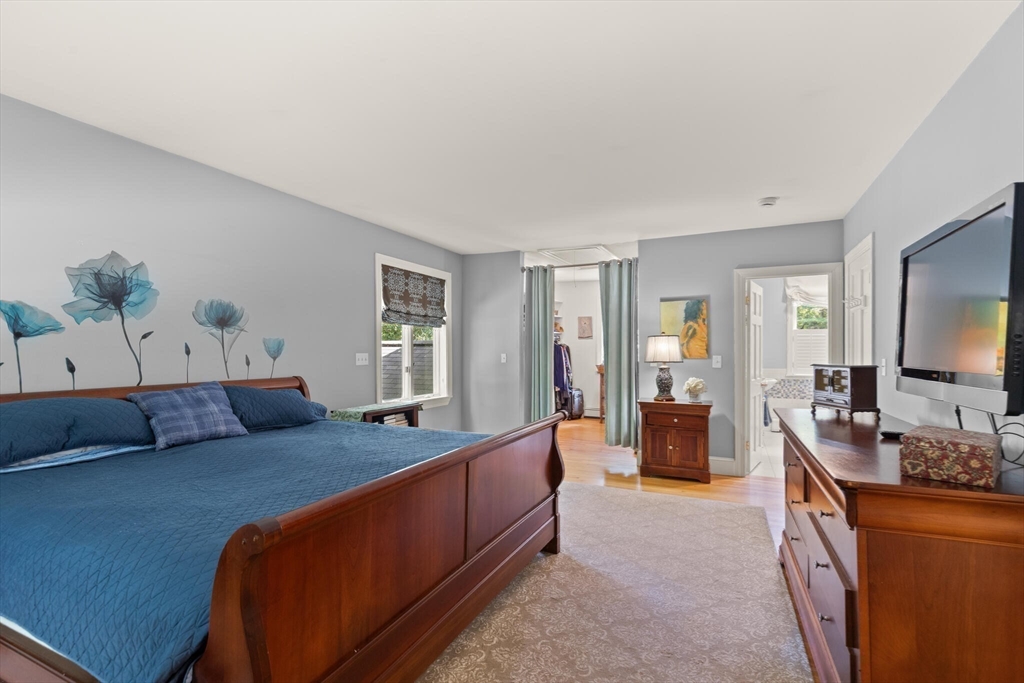 26 Cross Road Boxford, MA 01921 - Photo 26 of 41 a living room with furniture and a flat screen tv