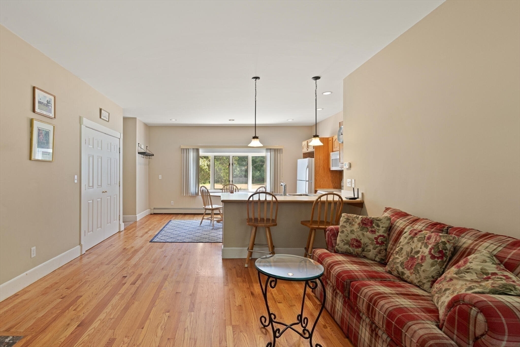 26 Cross Road Boxford, MA 01921 - Photo 29 of 41 a living room with furniture and a wooden floor