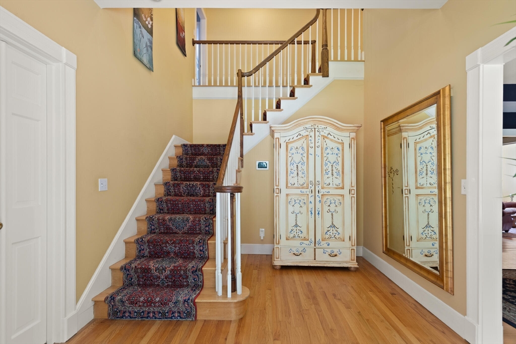 26 Cross Road Boxford, MA 01921 - Photo 3 of 41 a view of an entryway with wooden floor