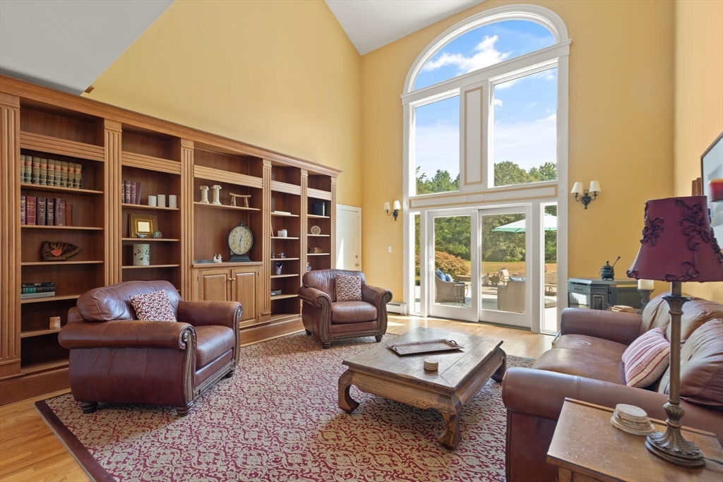26 Cross Road Boxford, MA 01921 - Photo 6 of 41 a living room with furniture and a large window