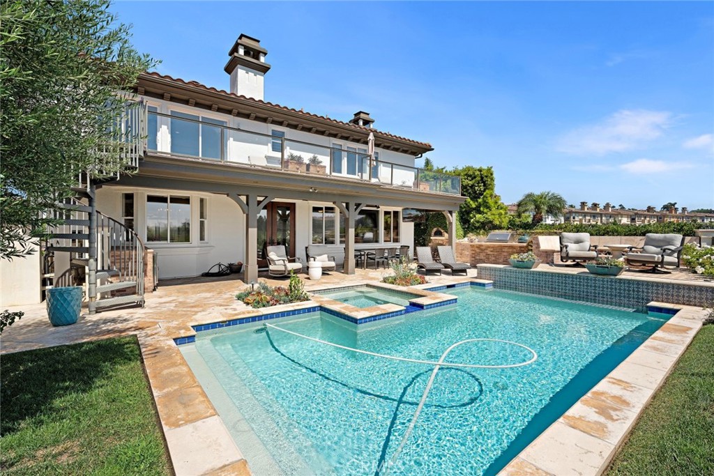 5 Via Monarca Street Dana Point, CA 92629 - Photo 40 of 64 a view of a house with swimming pool and sitting area