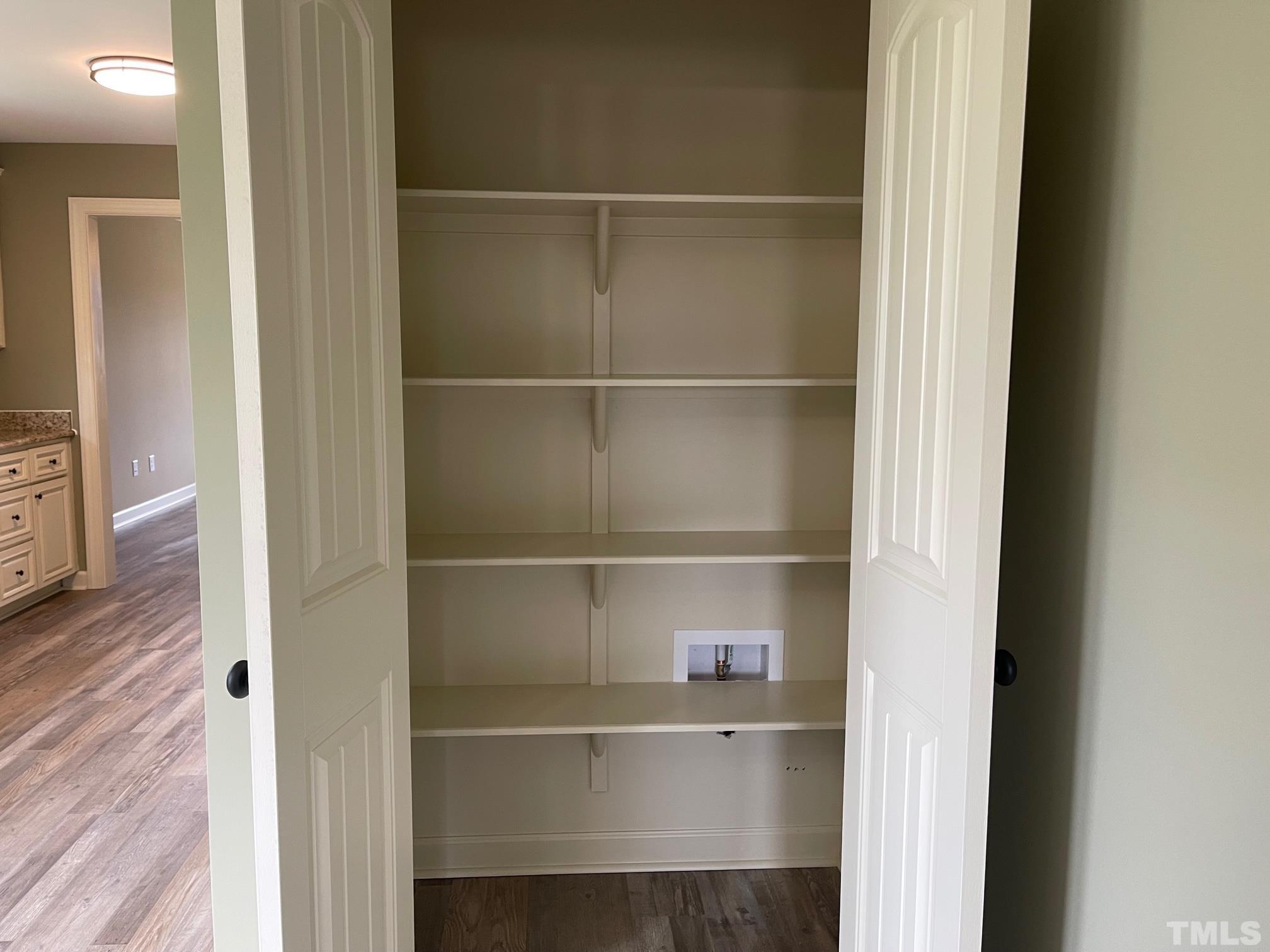 665 Bethel Church Road Angier, NC 27501 - Photo 10 of 32 a room with a wooden floor