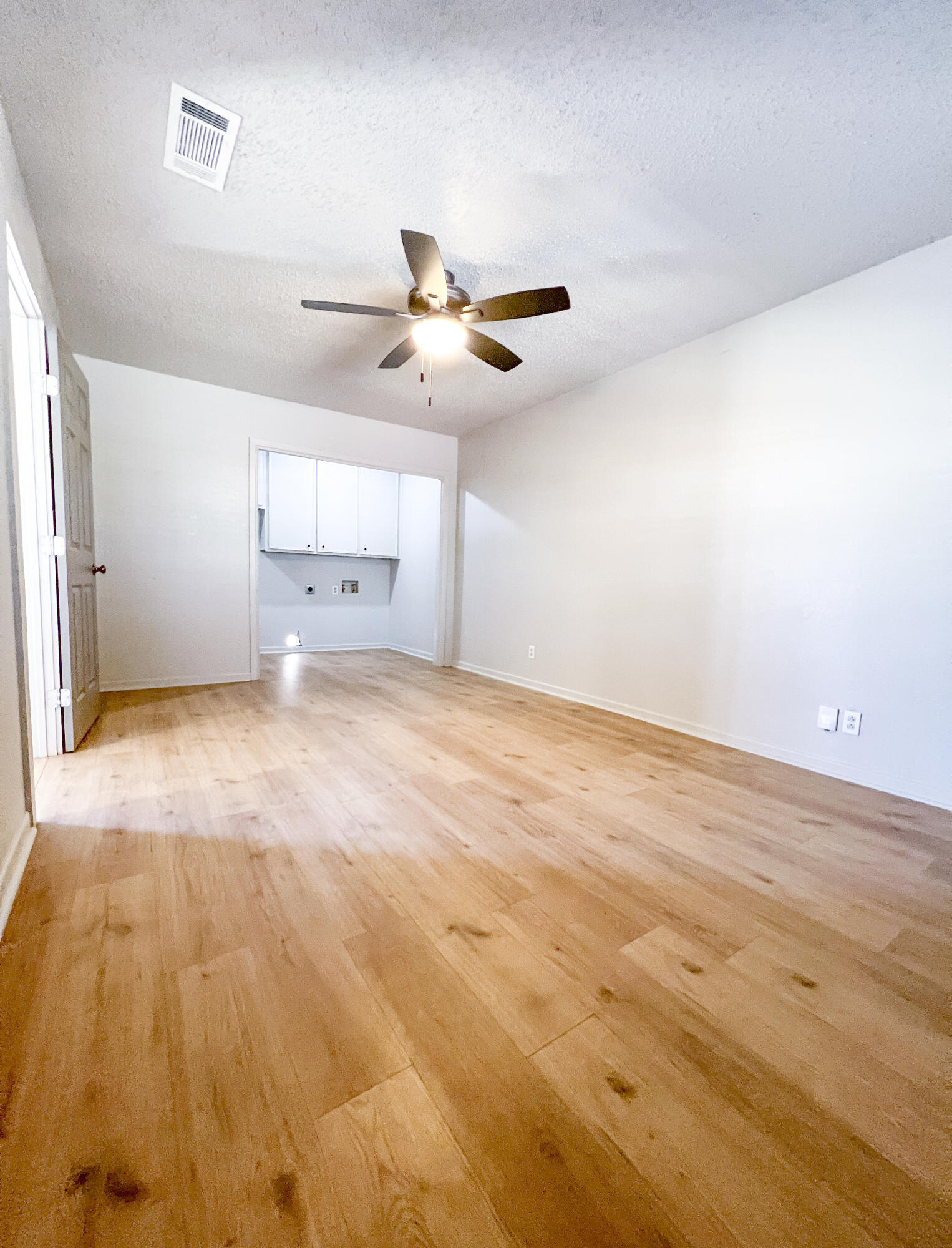 1513 37th Street Lubbock, TX 79412 - Photo 20 of 34 wooden floor in an empty room