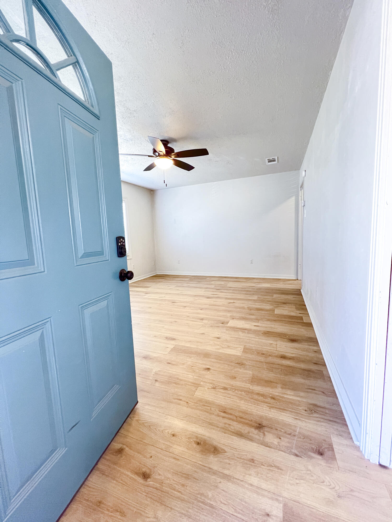 1513 37th Street Lubbock, TX 79412 - Photo 3 of 34 a view of a utility room with a sink
