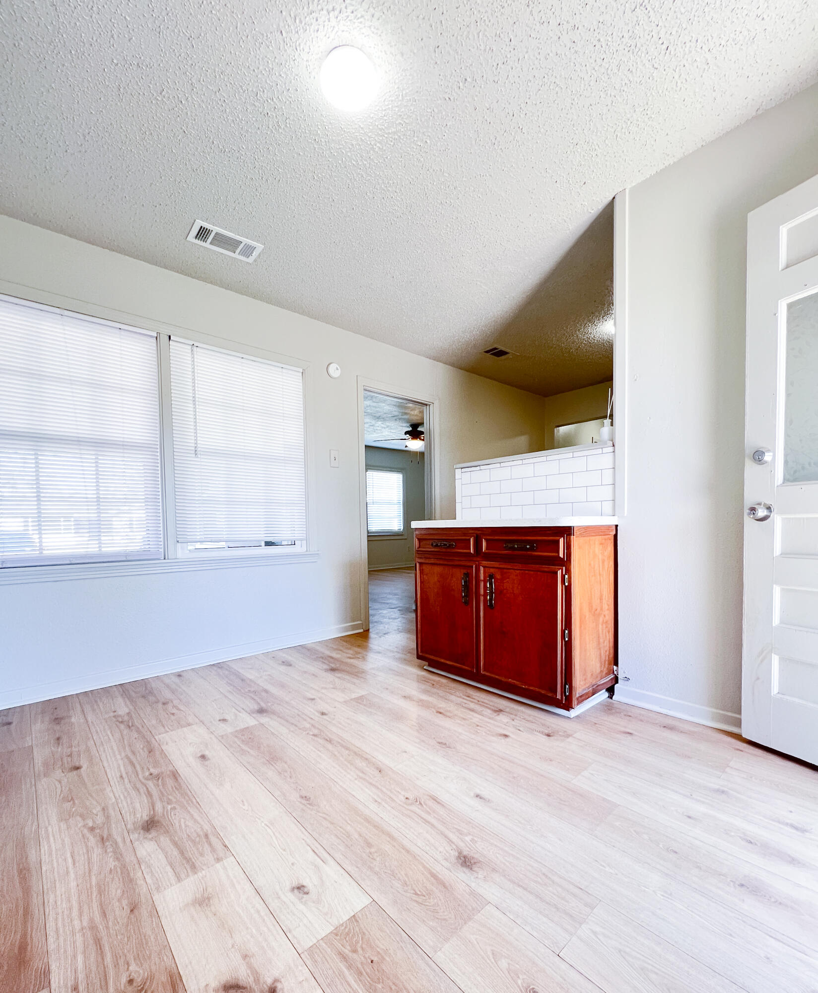 1513 37th Street Lubbock, TX 79412 - Photo 6 of 34 a view of kitchen and utility room
