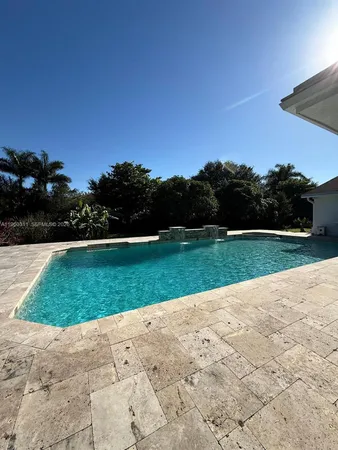 a view of a golf course with a garden