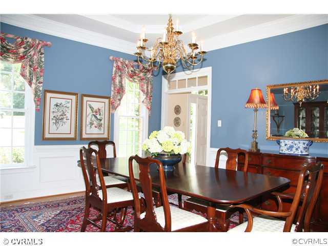 3931 Reeds Landing Circle Midlothian, VA 23113 - Photo 3 of 12 a view of a dining room with furniture and chandelier
