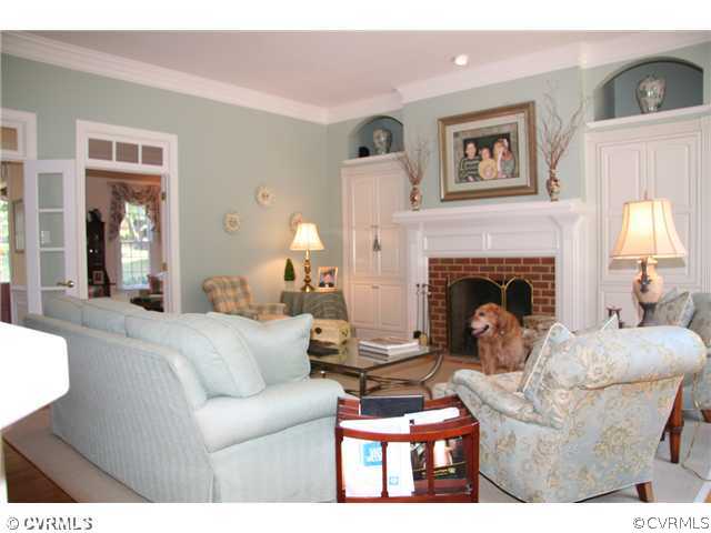 3931 Reeds Landing Circle Midlothian, VA 23113 - Photo 4 of 12 a living room with furniture and a fireplace
