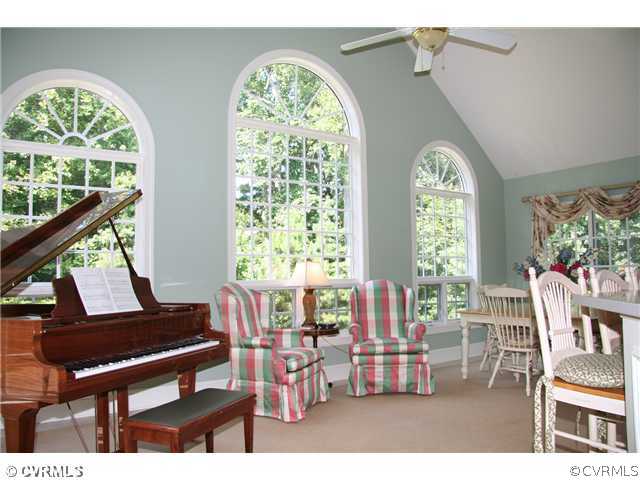 3931 Reeds Landing Circle Midlothian, VA 23113 - Photo 7 of 12 a living room with furniture and a large window
