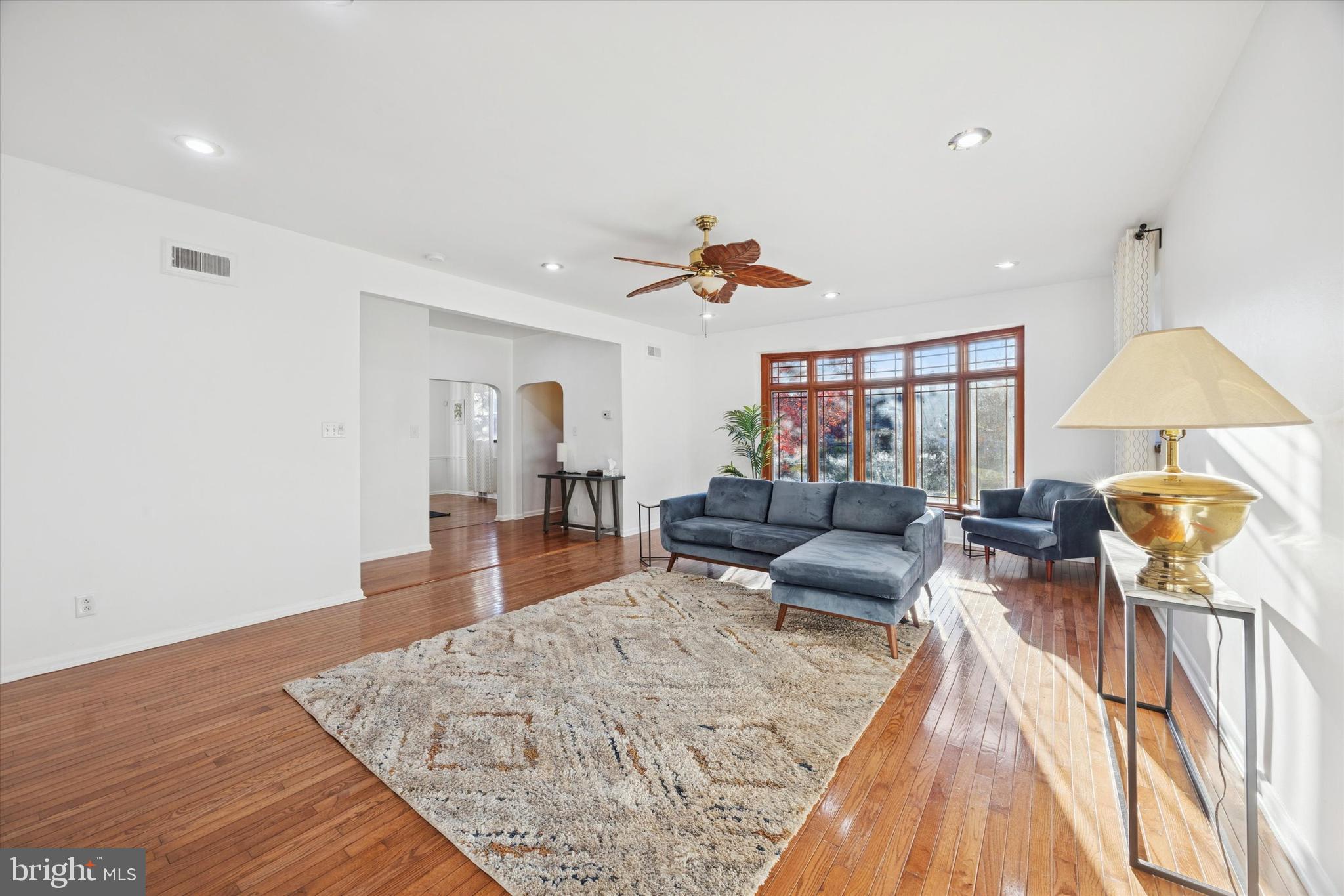7033 Sherwood Road Philadelphia, PA 19151 - Photo 5 of 16 a living room with furniture and a wooden floor