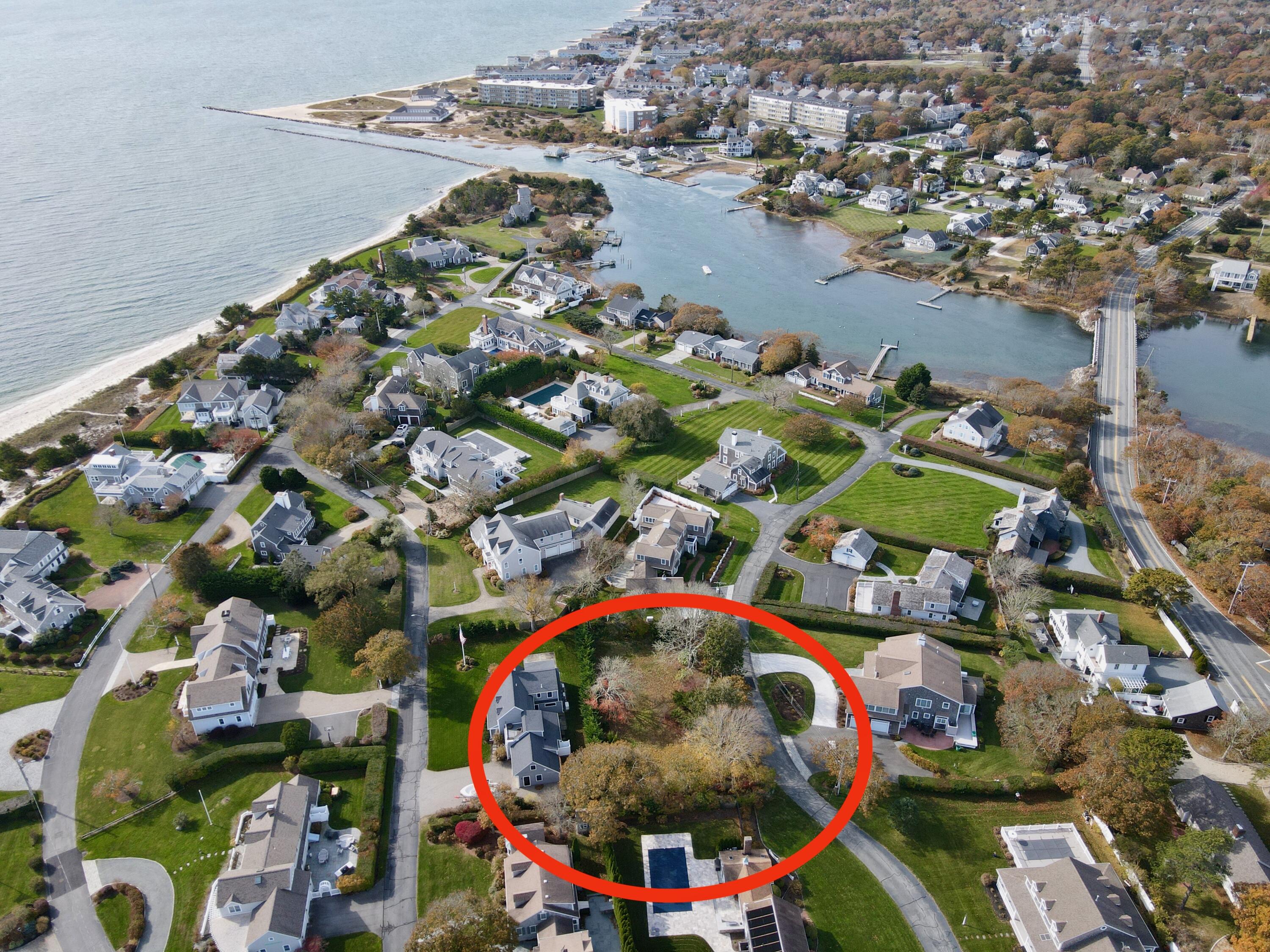 19 Riverway West Harwich, MA 02671 - Photo 2 of 15 an outdoor space with swimming pool and outdoor seating