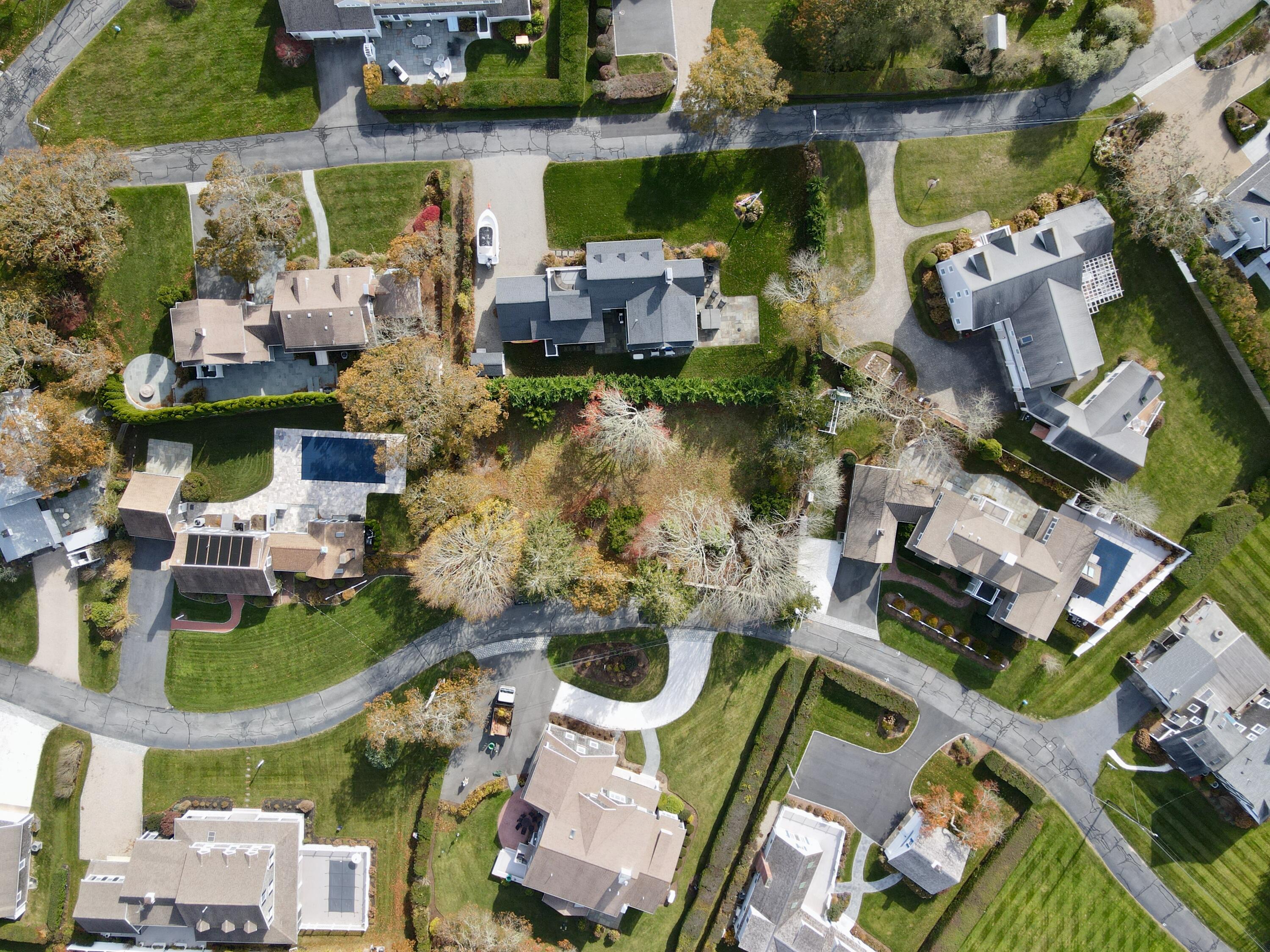 19 Riverway West Harwich, MA 02671 - Photo 5 of 15 an aerial view of a house with a ocean view