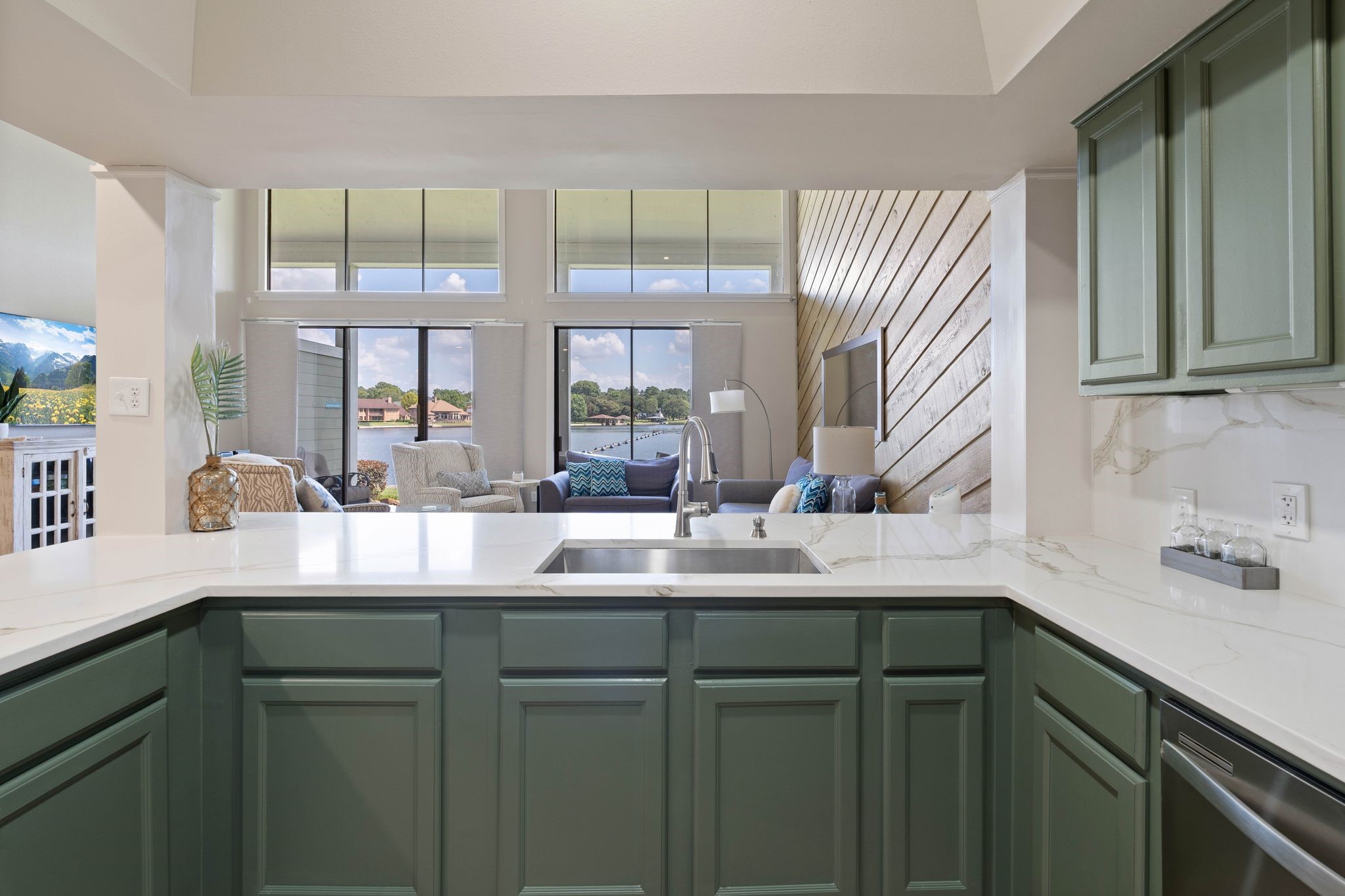 68 April Point Drive South, Unit E68 Conroe, TX 77356 - Photo 15 of 46 a kitchen with a sink and a window