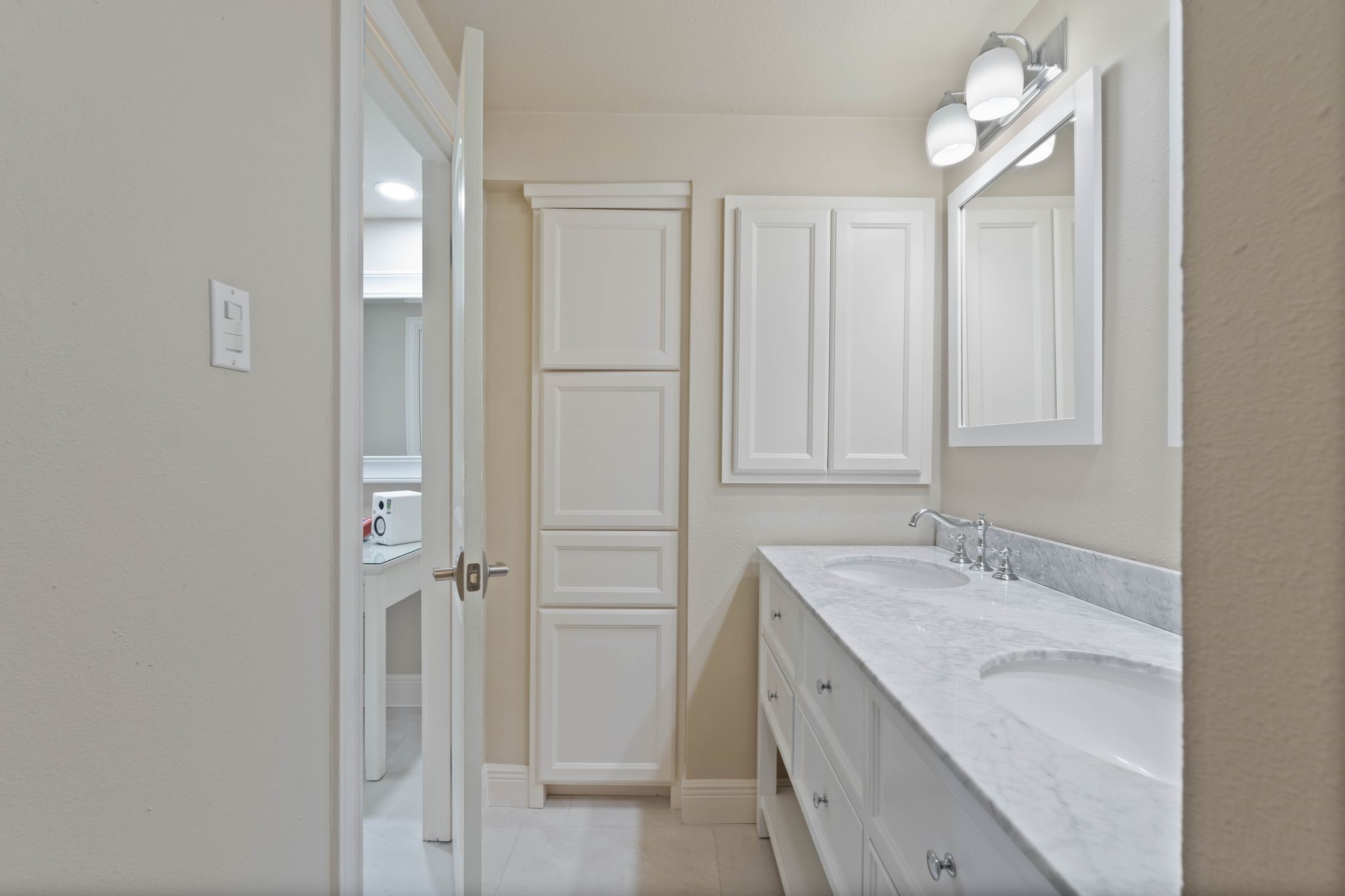 68 April Point Drive South, Unit E68 Conroe, TX 77356 - Photo 21 of 46 a bathroom with a granite countertop sink and a mirror
