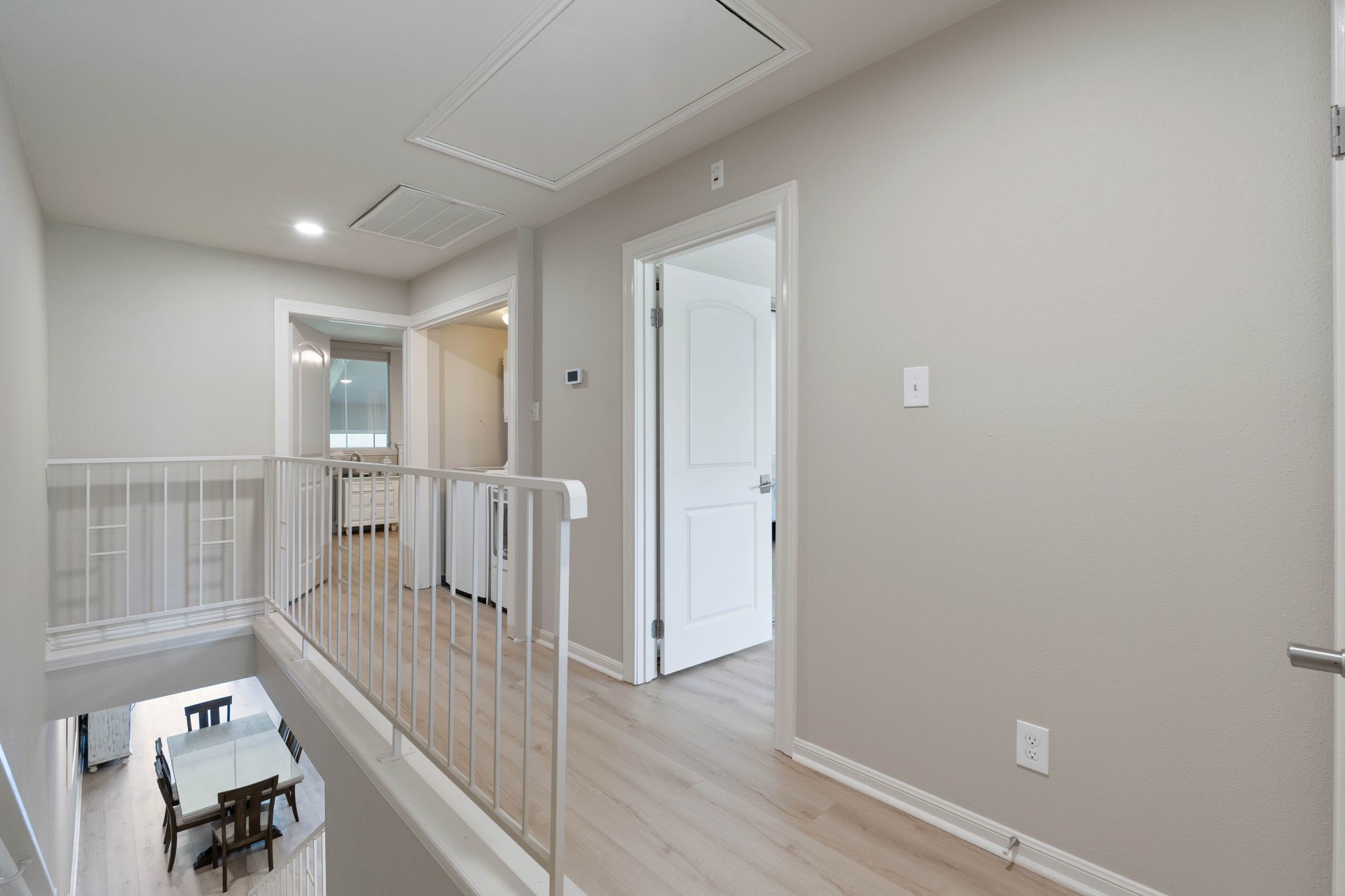 68 April Point Drive South, Unit E68 Conroe, TX 77356 - Photo 25 of 46 a view of entryway with wooden floor