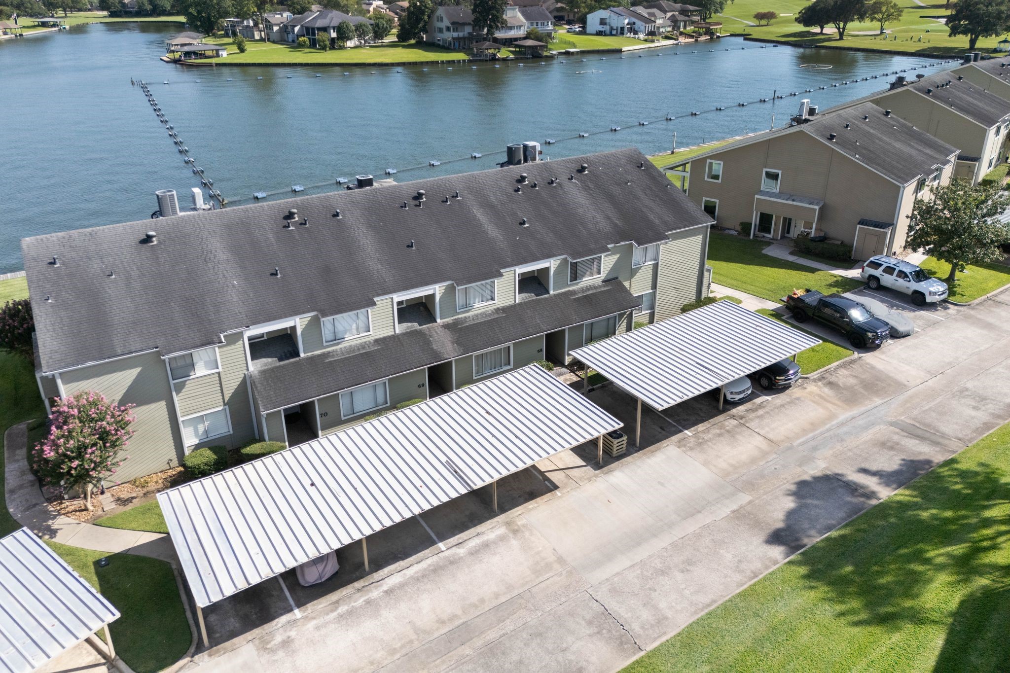 68 April Point Drive South, Unit E68 Conroe, TX 77356 - Photo 37 of 46 an aerial view of a house with ocean view