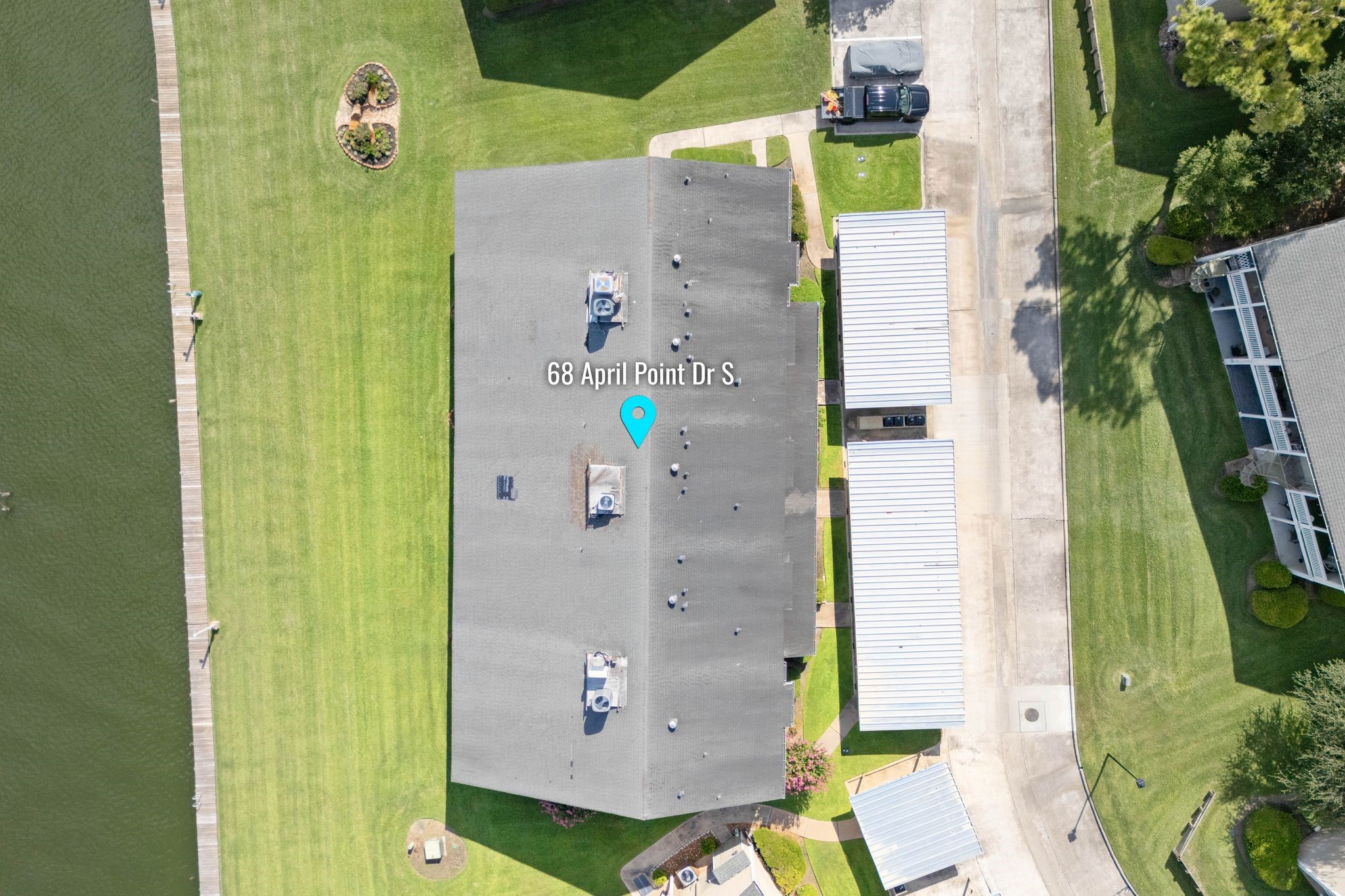 68 April Point Drive South, Unit E68 Conroe, TX 77356 - Photo 40 of 46 an aerial view of residential house with outdoor space