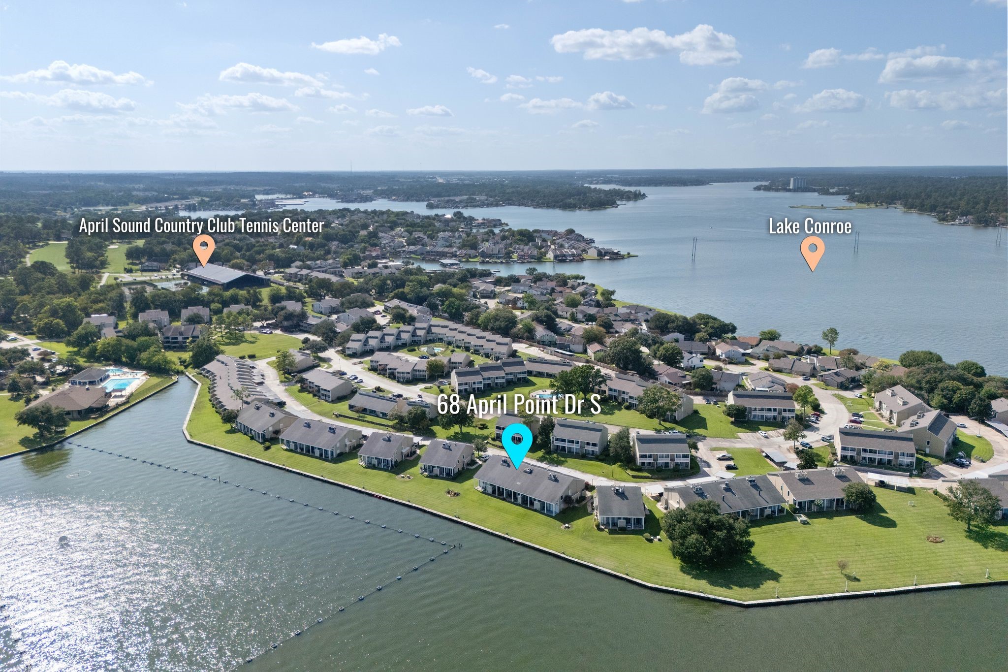 68 April Point Drive South, Unit E68 Conroe, TX 77356 - Photo 42 of 46 an aerial view of a city