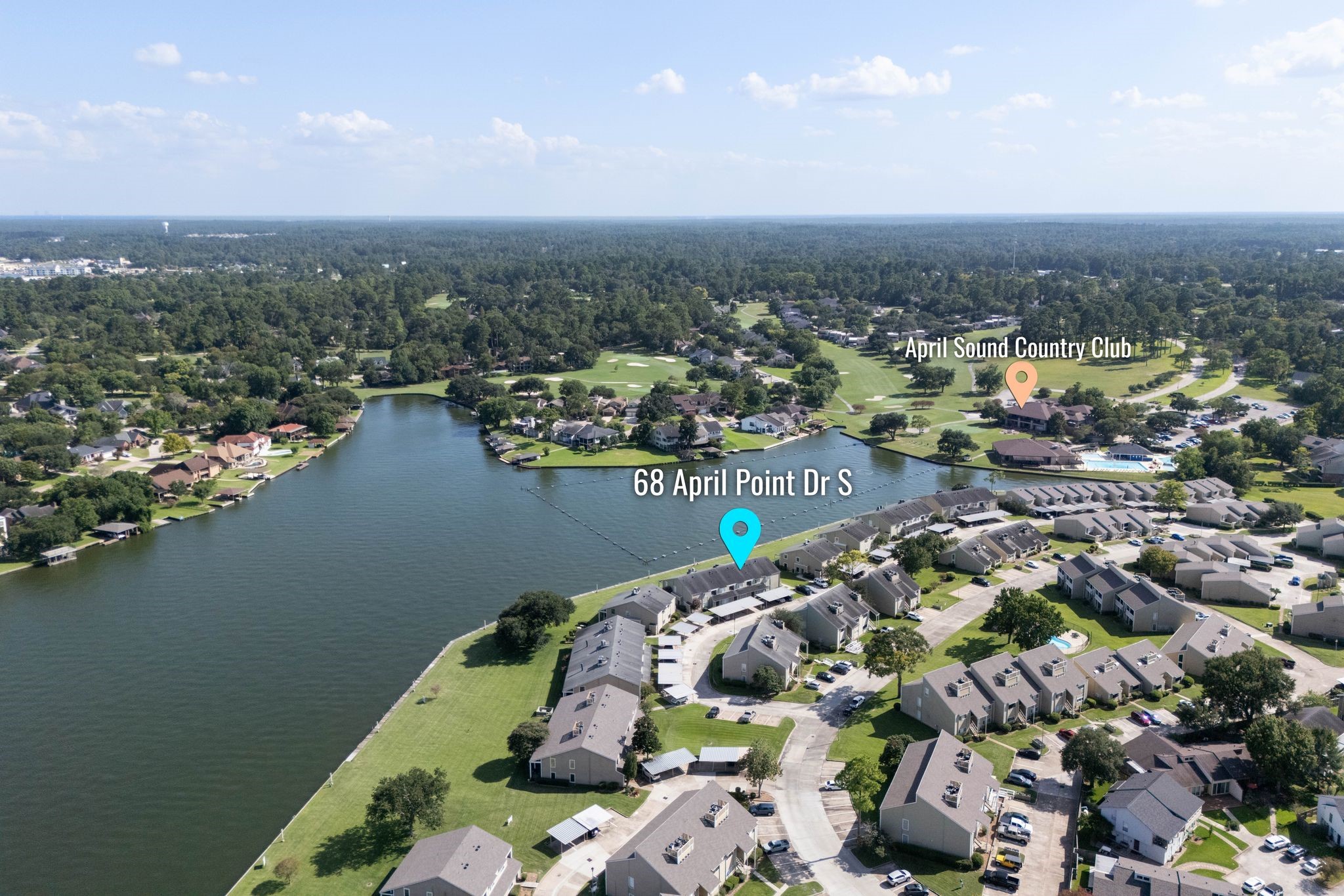 68 April Point Drive South, Unit E68 Conroe, TX 77356 - Photo 44 of 46 an aerial view of a city with ocean view