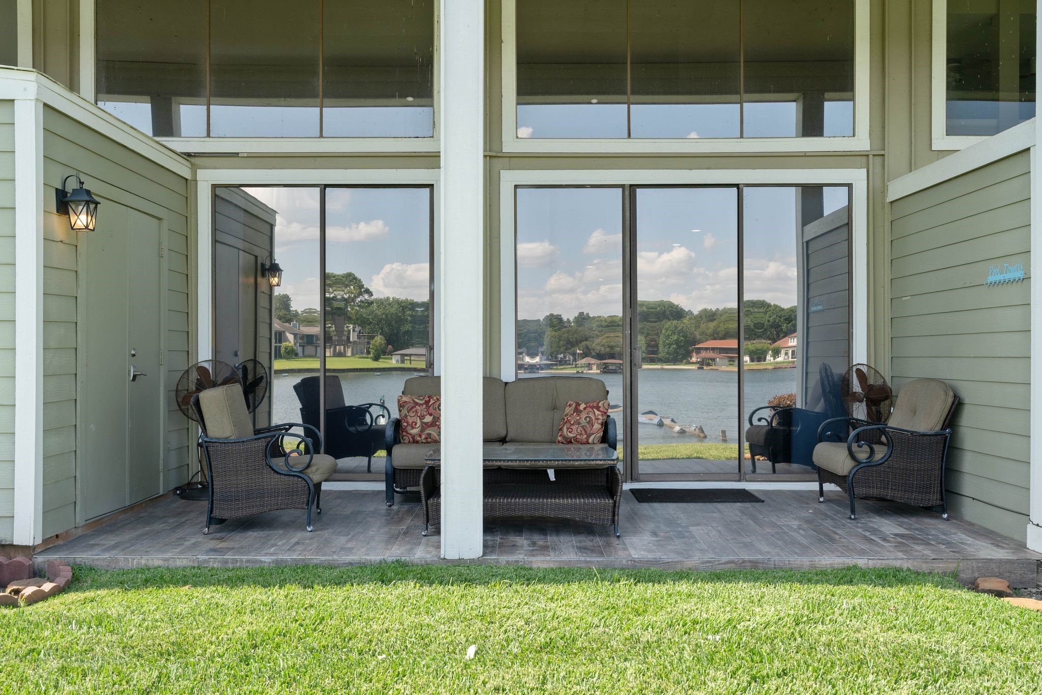 68 April Point Drive South, Unit E68 Conroe, TX 77356 - Photo 46 of 46 a patio with table and chairs
