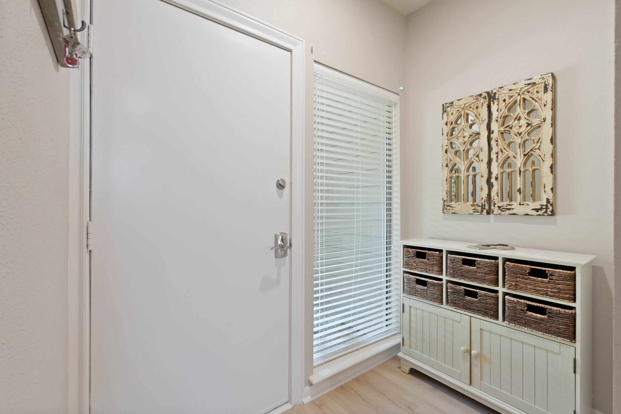 68 April Point Drive South, Unit E68 Conroe, TX 77356 - Photo 6 of 46 a view of a hallway with closet area