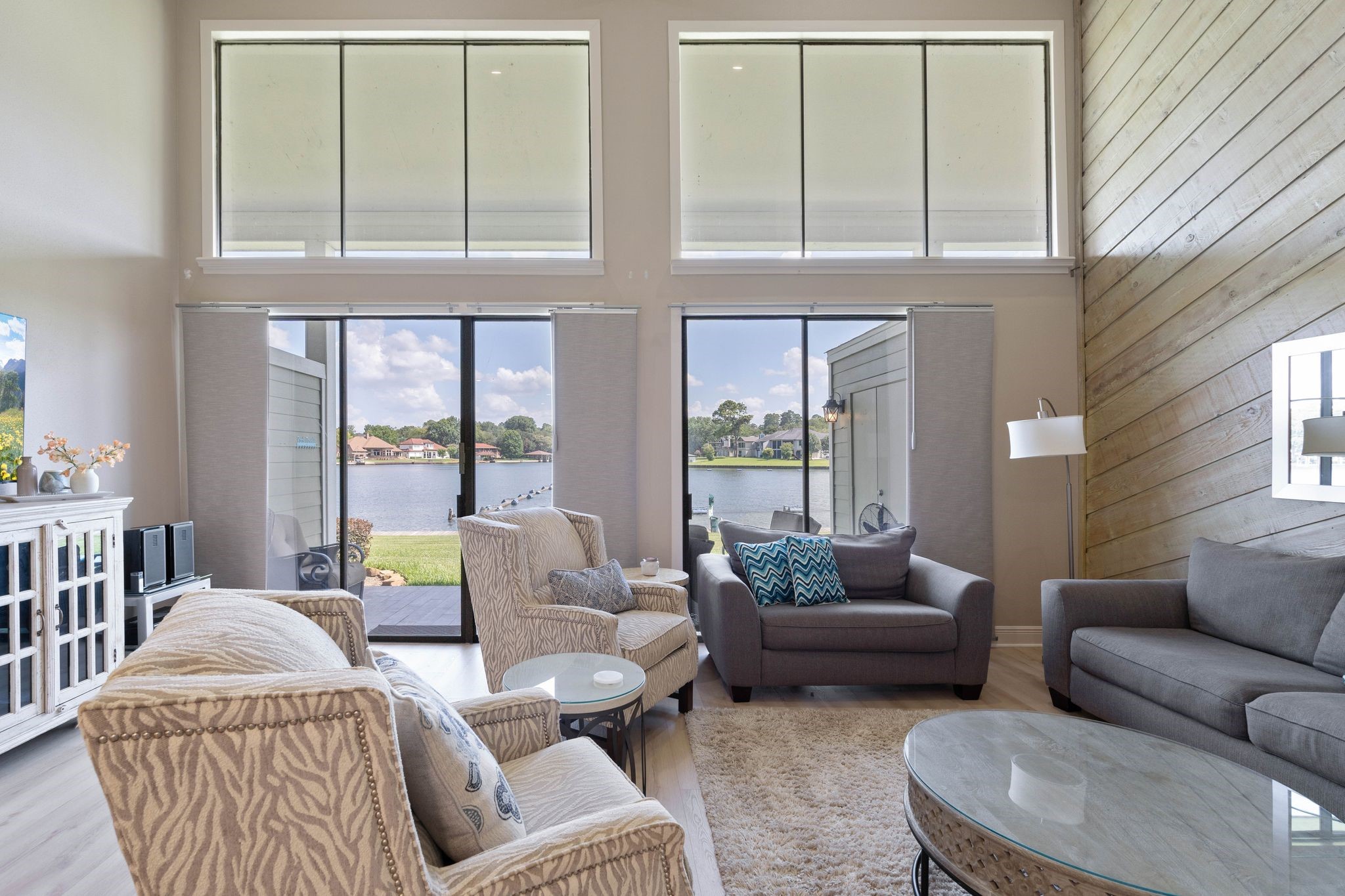 68 April Point Drive South, Unit E68 Conroe, TX 77356 - Photo 10 of 46 a living room with furniture and a window