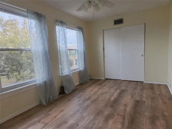 an empty room with windows