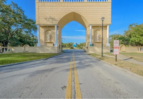 a view of pool with yard