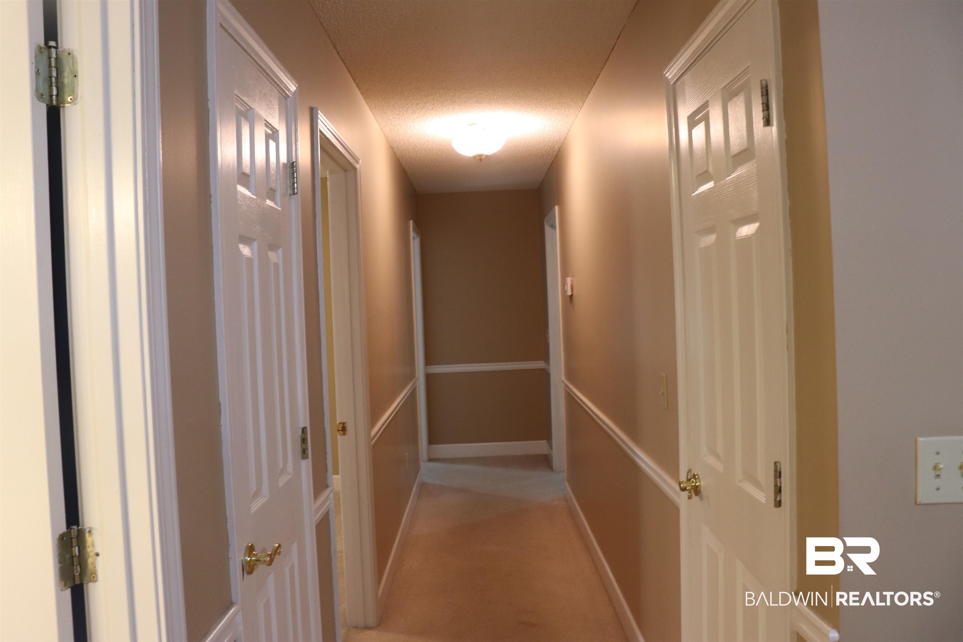 1823 Experiment Farm Road Monroeville, AL 36460 - Photo 18 of 46 lower level hallway